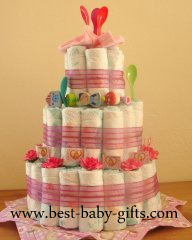 big diaper cake decorated with lots of flowers