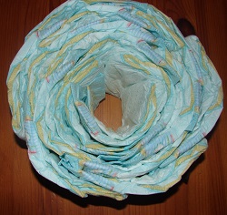 several layers of stacked diapers in the cake setting ring
