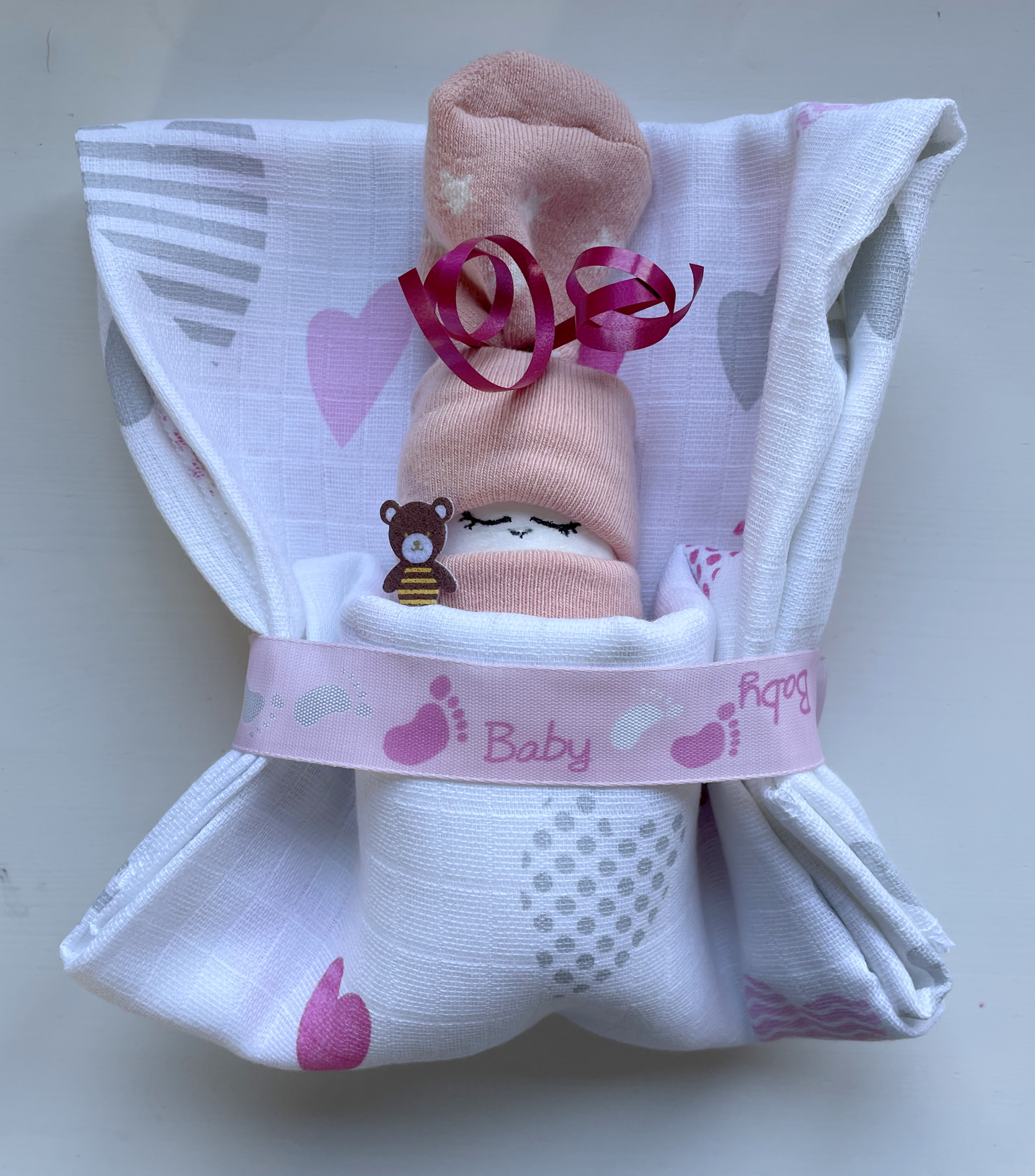 a cute little diaper baby in a "sleeping bag"